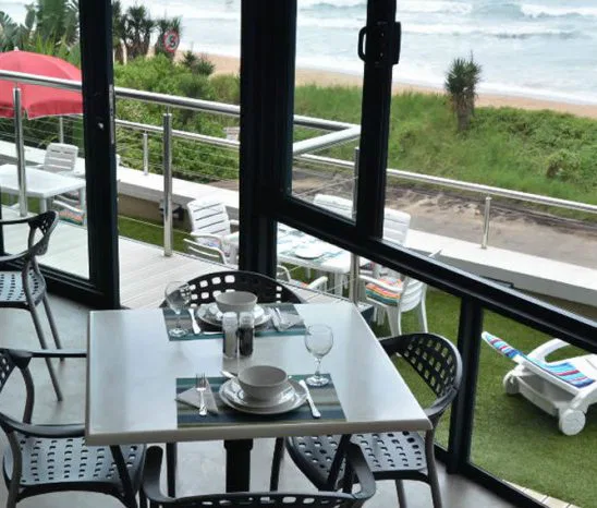 Diese Aussicht zum Frühstück weckt die Unternehmungslust für den bevorstehenden Tag. suedafrika-dolphin-coast-greenfire-verandah